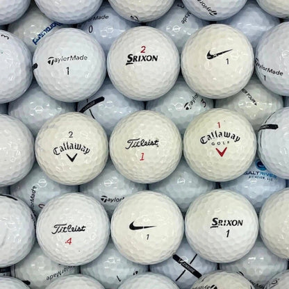 Tour Golf Balls stacked with logos facing up.